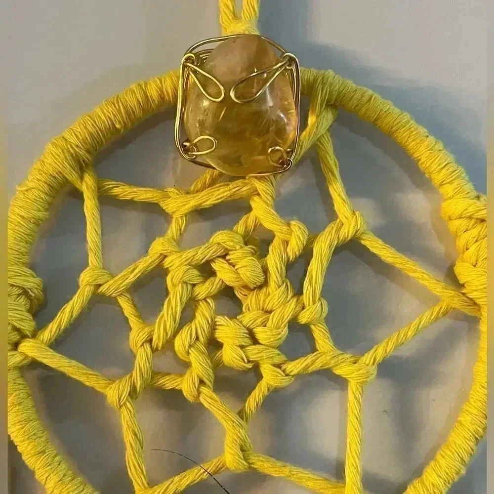 Lorena Espinoza Designs handmade yellow dream catcher with gemstone